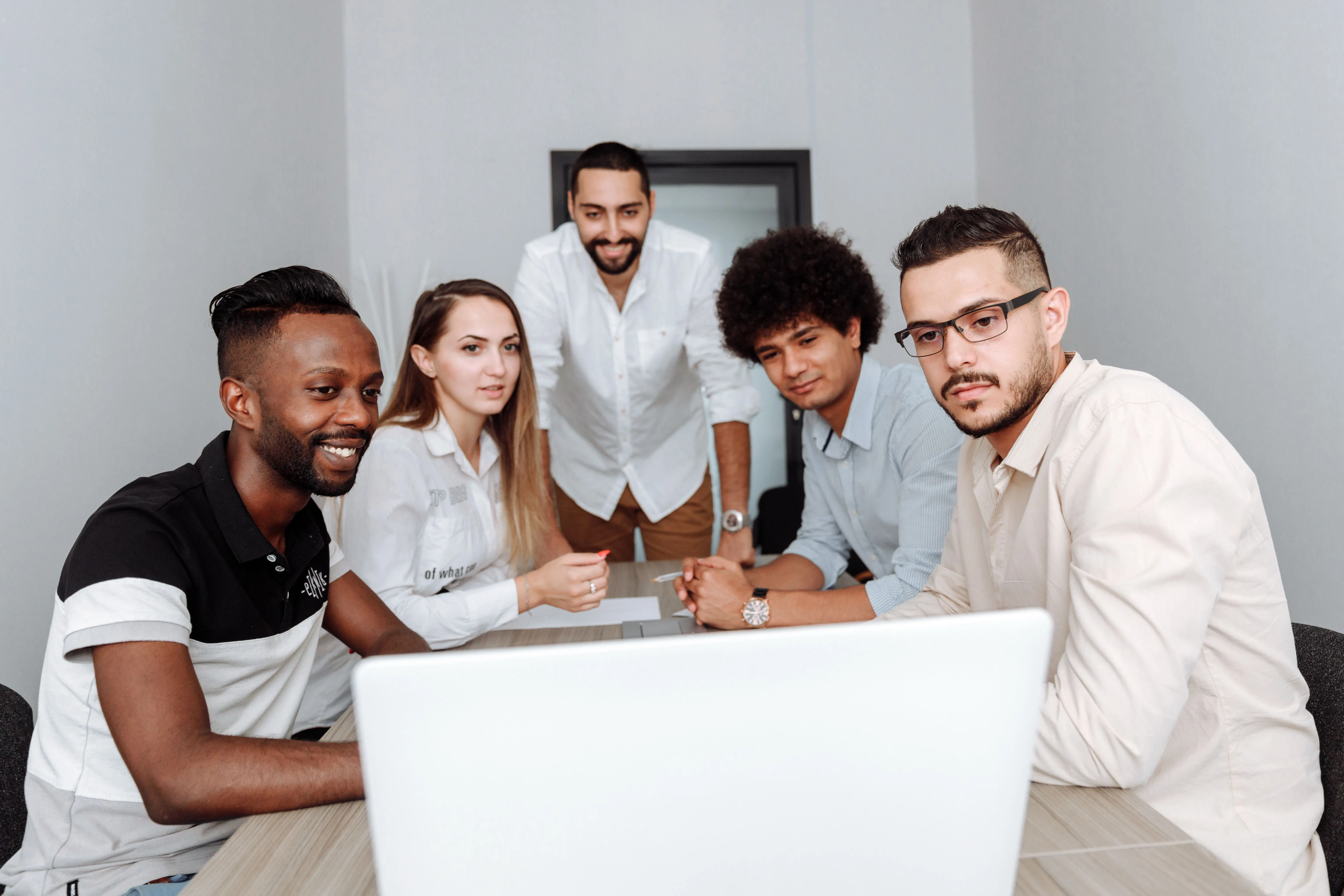 The Deltacubes engineering team collaborating in the office